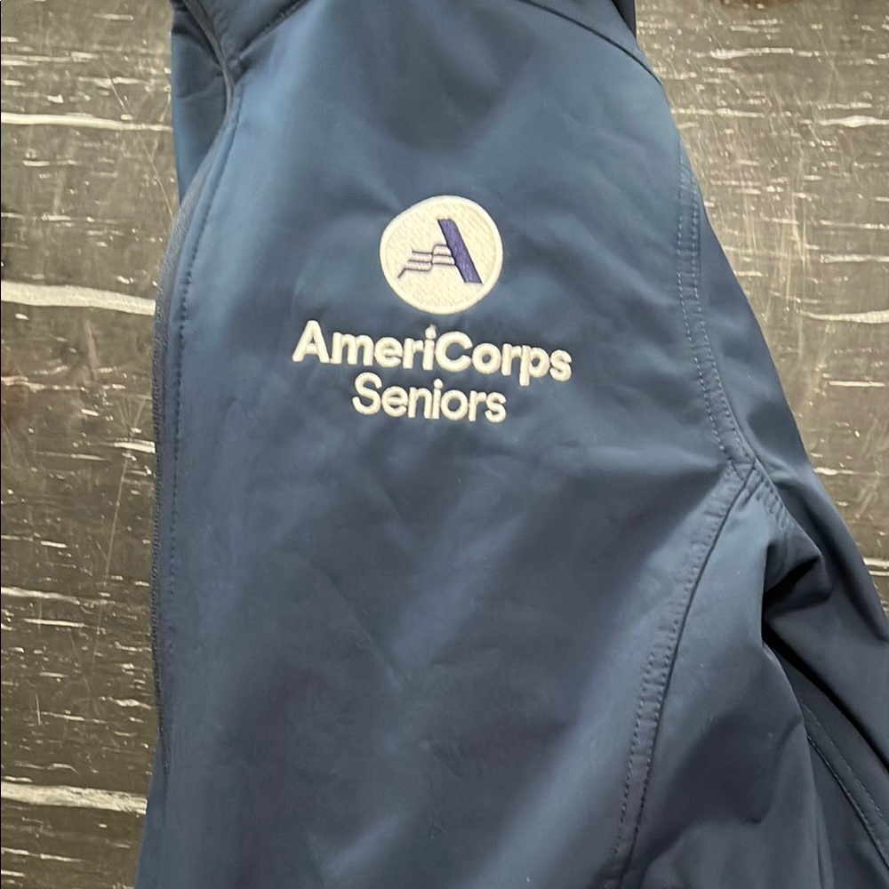 Port Authority Blue Windbreaker with AmeriCorps Seniors Logo